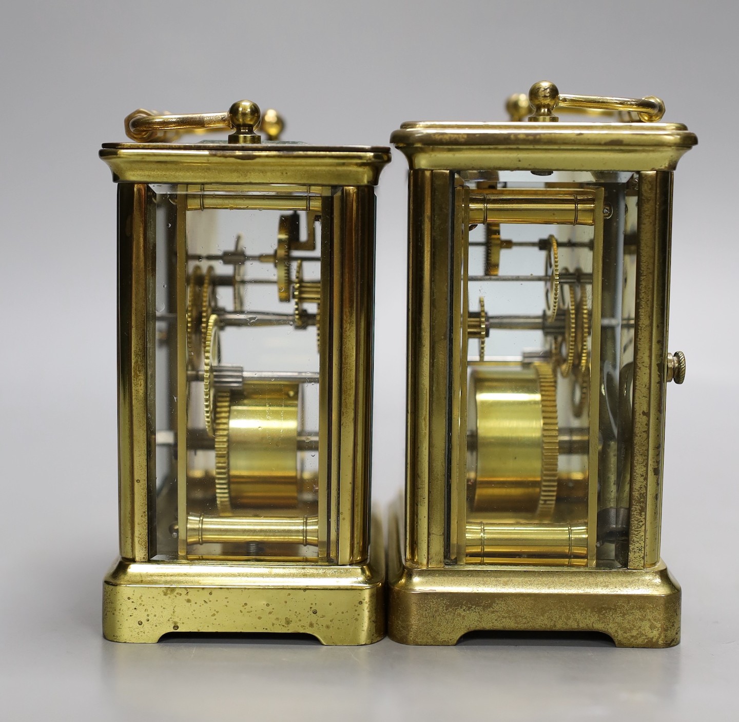 Two brass cased carriage timepieces. Tallest 12cm